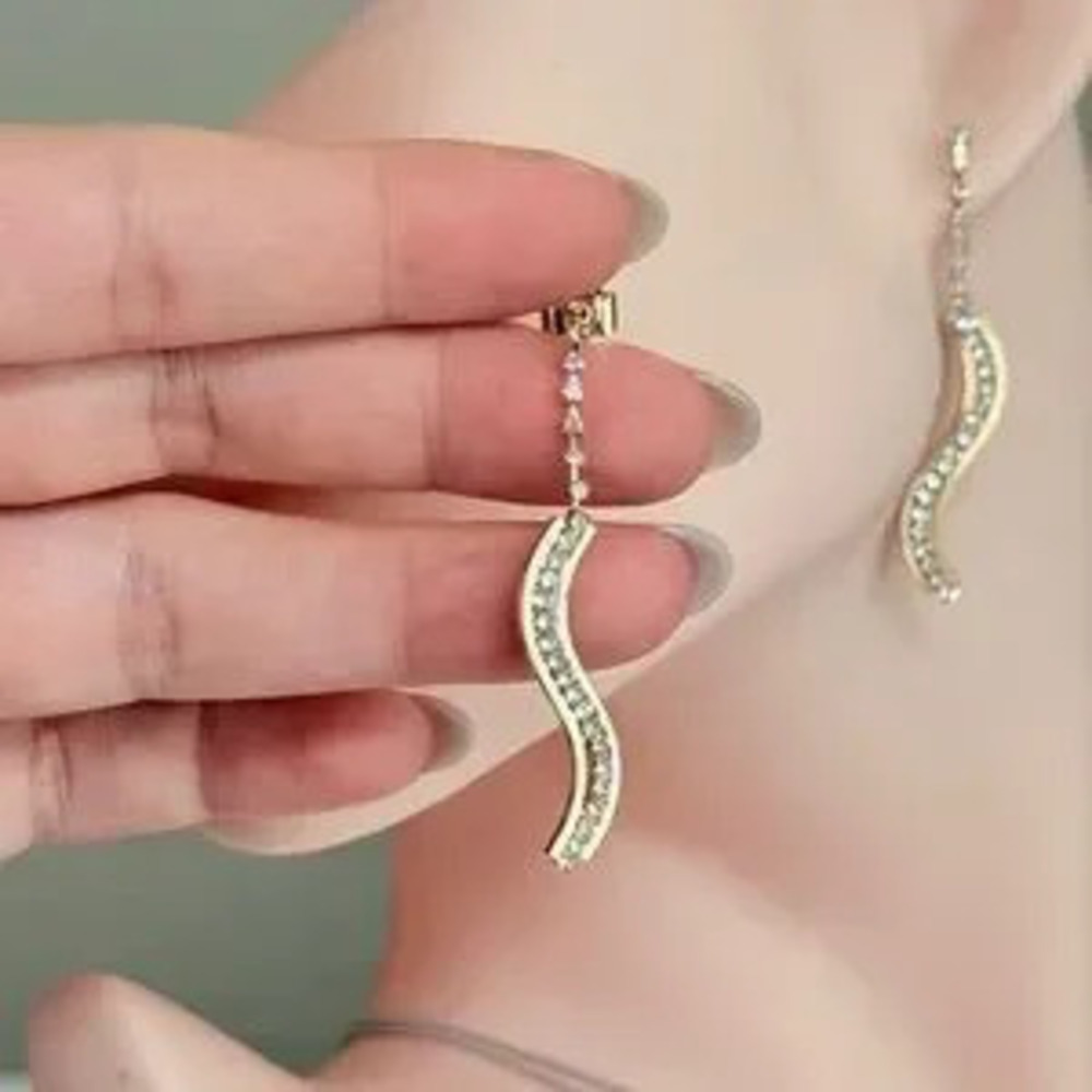Elegant Gold and Silver Wave Earrings